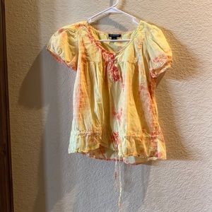 A cute top in the brand fashion fuse